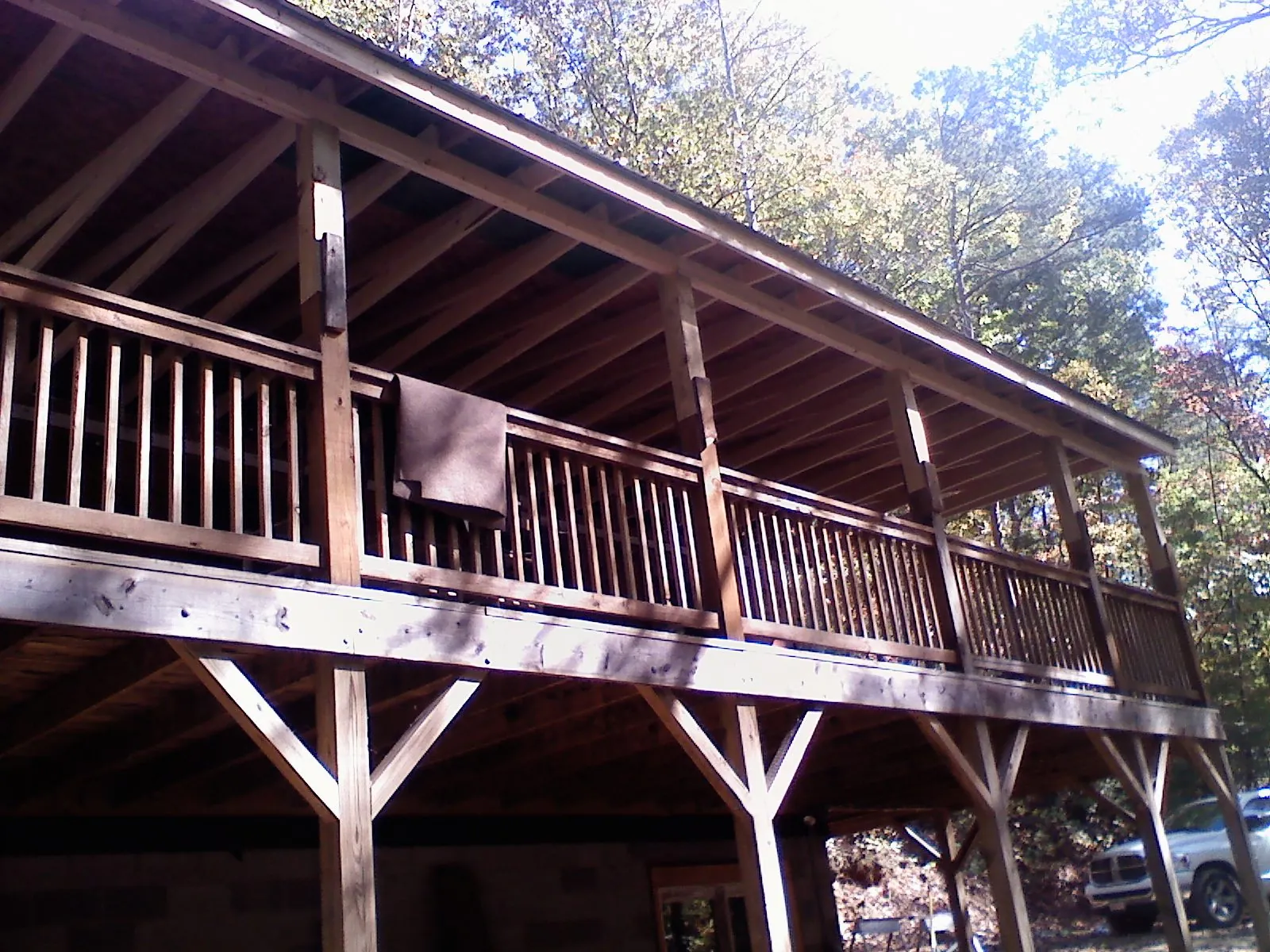 Timber framing under a new elevated porch and deck — Roof Leak Repair in Truro by Roofing Brothers